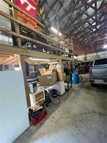 a view of parking garage with cars