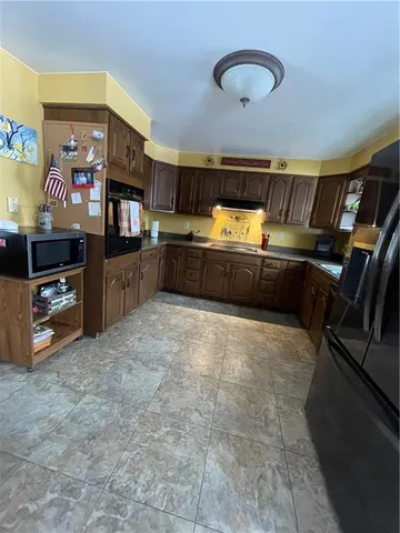 a room with furniture and a flat screen tv