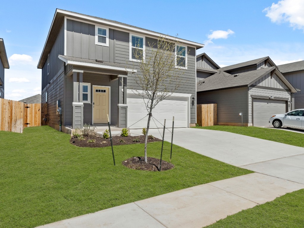 121 Greenway Drive Georgetown, TX 78628 - Photo 1 of 1 a view of a brick house with a yard