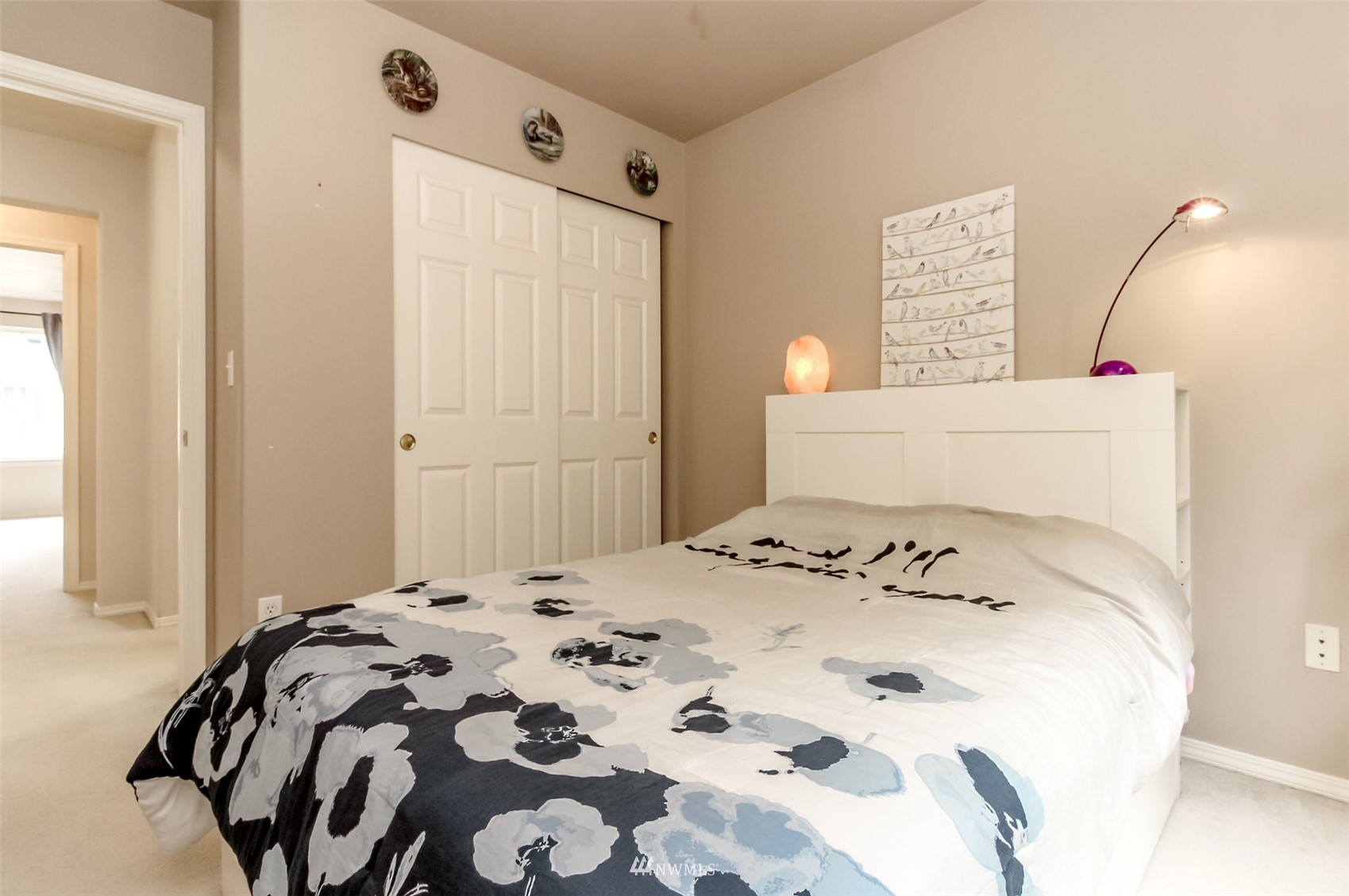 4632 Northeast 5th Court Renton, WA 98059 - Photo 17 of 23 a bedroom with a bed and a window