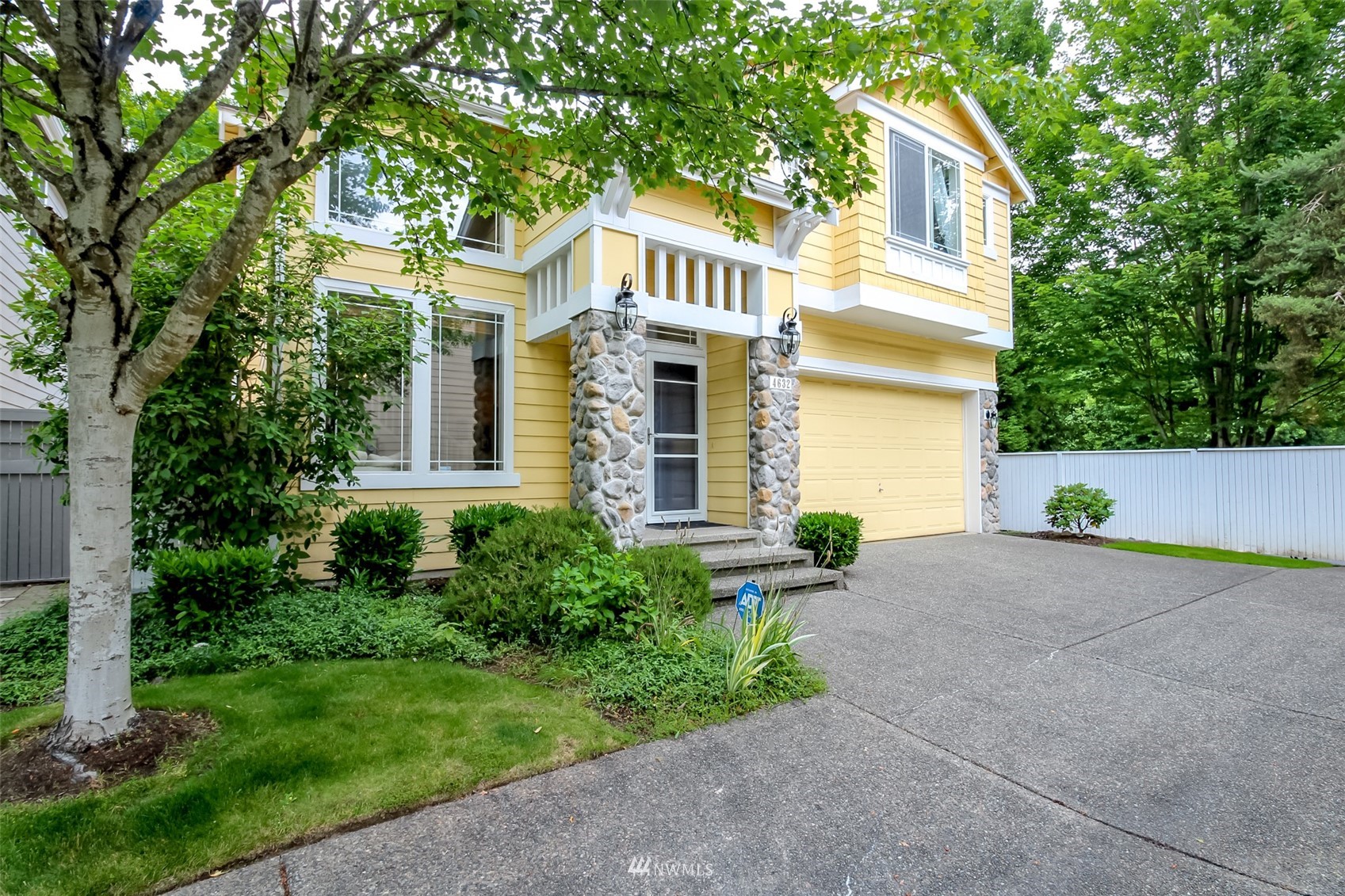 4632 Northeast 5th Court Renton, WA 98059 - Photo 23 of 23 a front view of a house with garden