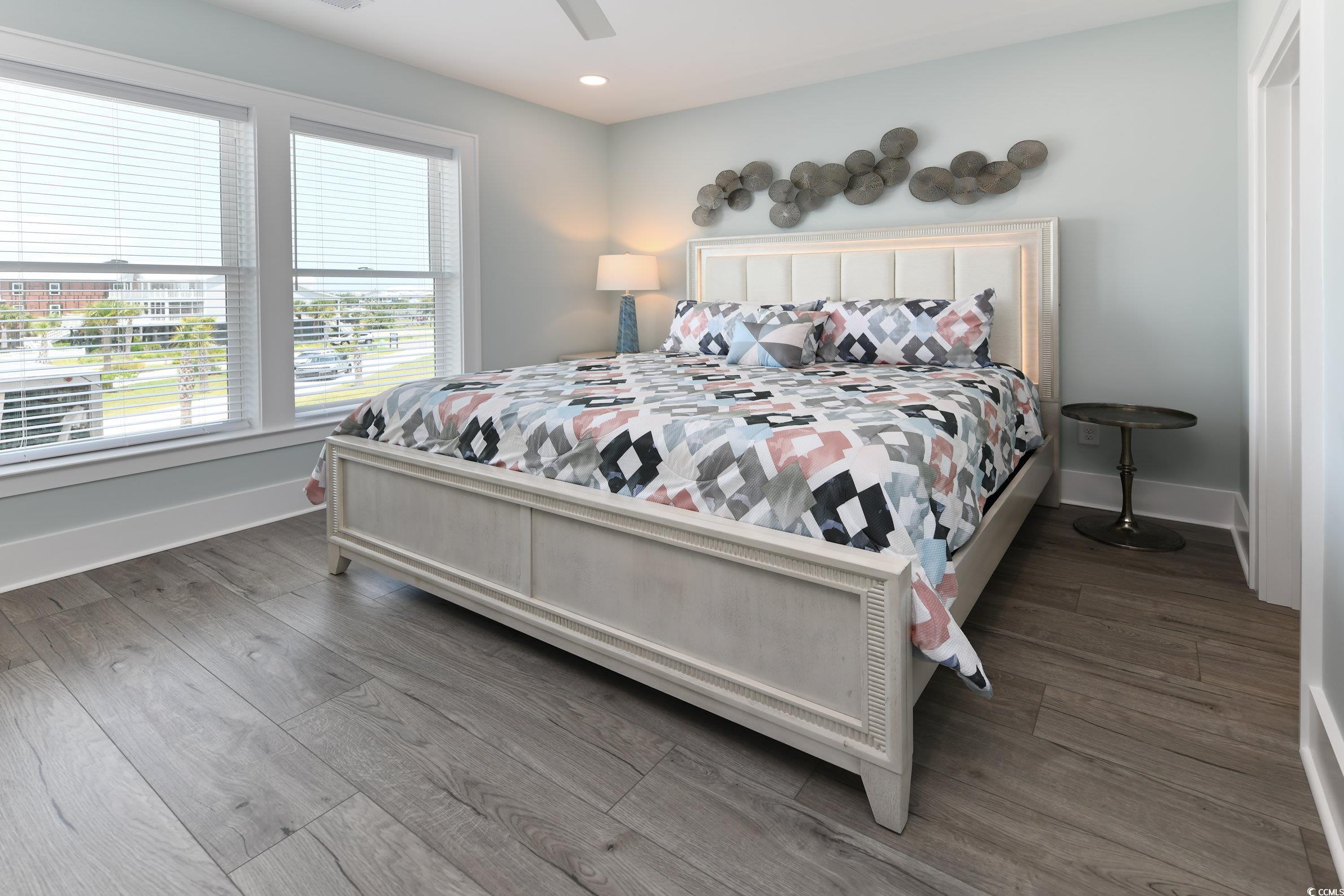 2349 South Waccamaw Drive Murrells Inlet, SC 29576 - Photo 18 of 39 Bedroom featuring a ceiling fan, recessed lighting, baseboards, and wood finished floors