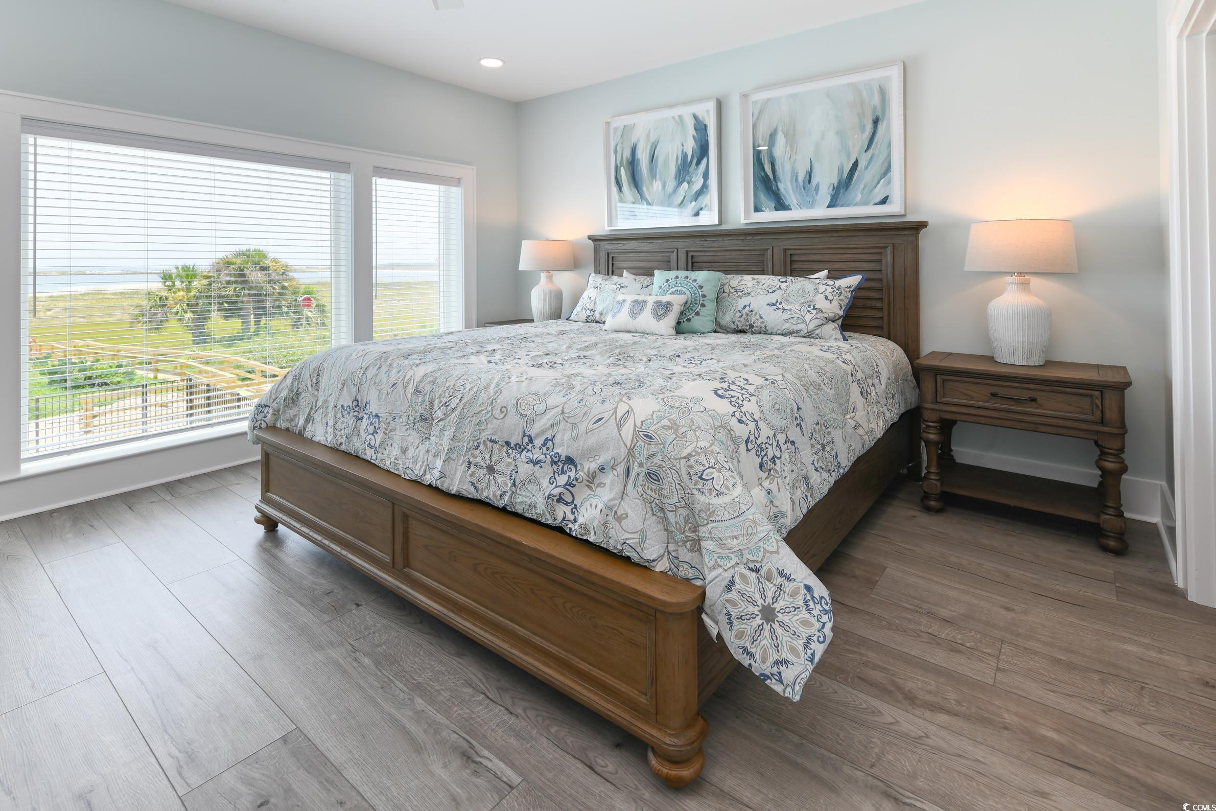 2349 South Waccamaw Drive Murrells Inlet, SC 29576 - Photo 32 of 39 Bedroom featuring recessed lighting, baseboards, and wood finished floors