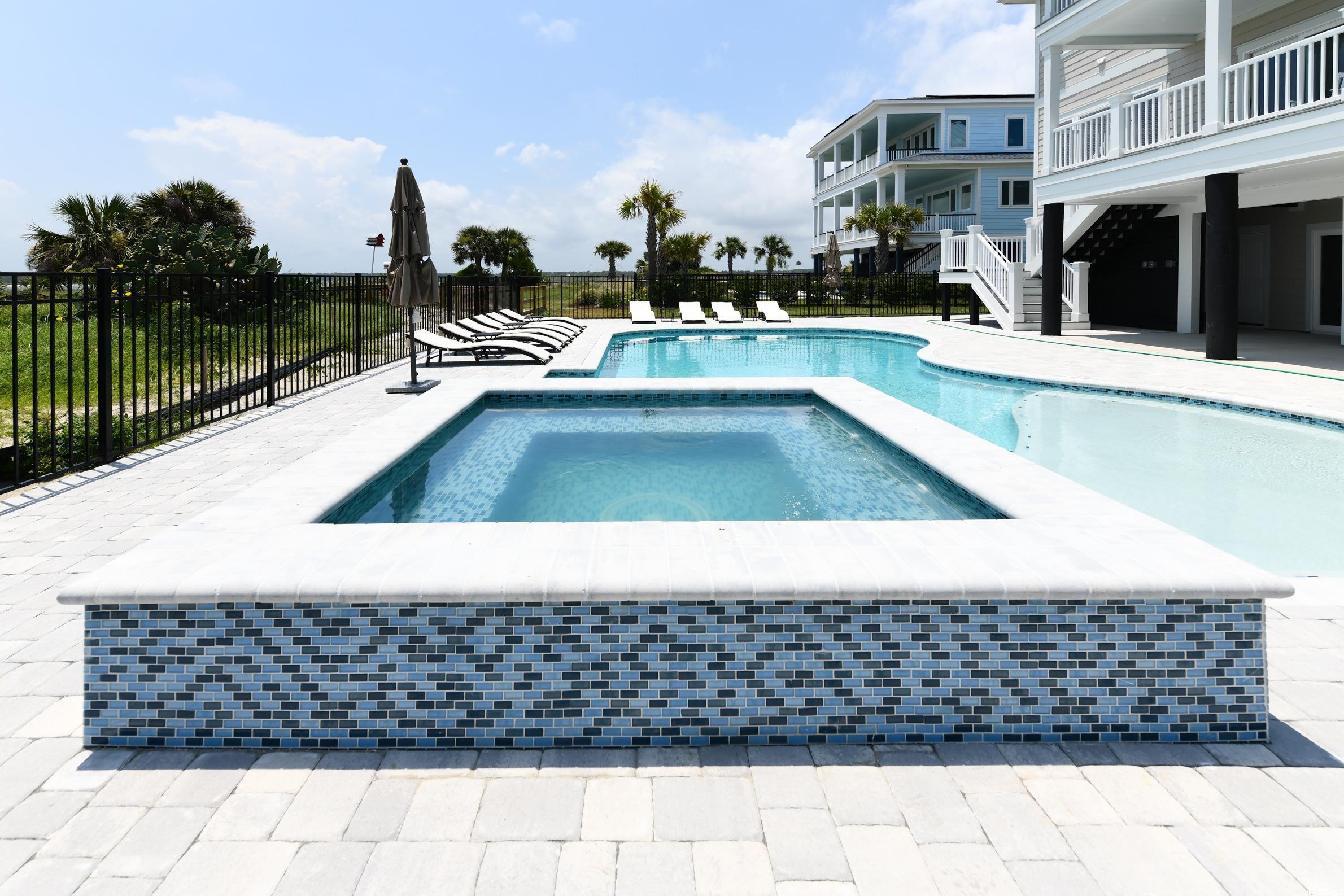 2349 South Waccamaw Drive Murrells Inlet, SC 29576 - Photo 36 of 39 View of pool with fence, a fenced in pool, a patio area, and an in ground hot tub