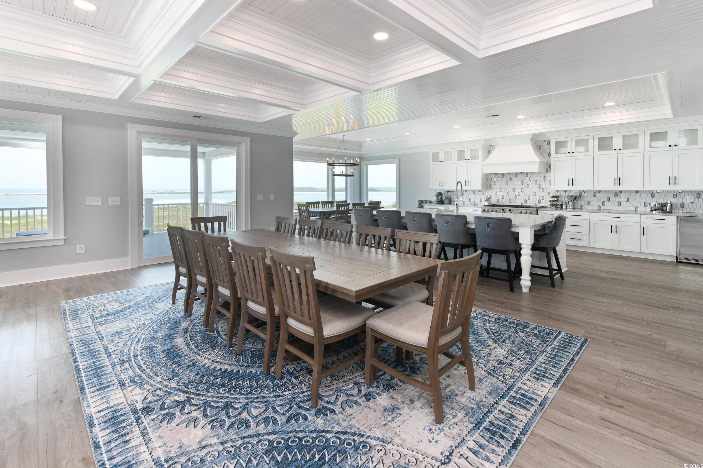 2349 South Waccamaw Drive Murrells Inlet, SC 29576 - Photo 6 of 39 Dining space featuring ornamental molding and a wealth of natural light