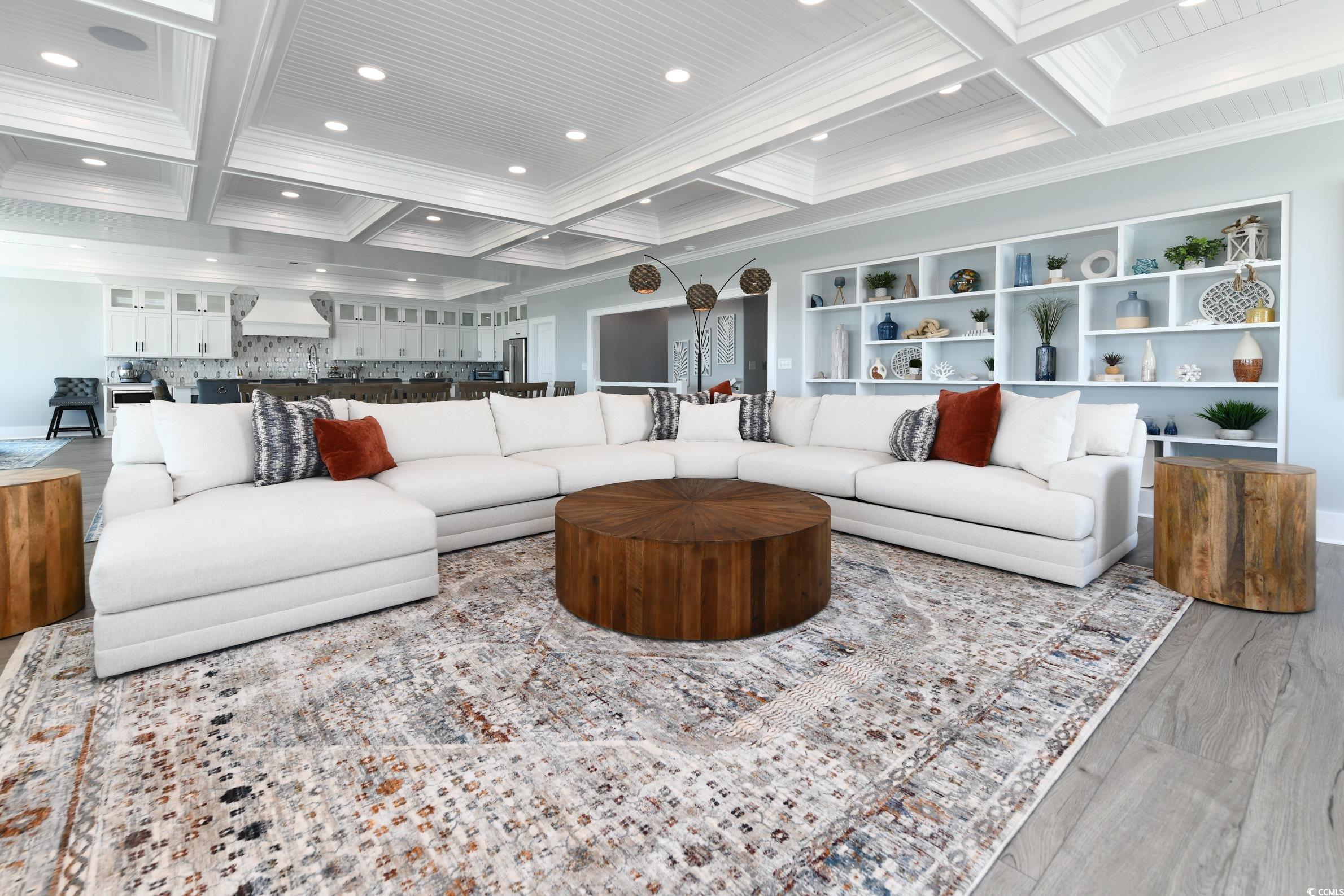 2349 South Waccamaw Drive Murrells Inlet, SC 29576 - Photo 8 of 39 Living area featuring ornamental molding, recessed lighting, coffered ceiling, and beam ceiling