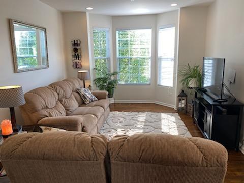 2847 Henley Lane Naperville, IL 60540 - Photo 5 of 9 a living room with furniture fireplace and a window