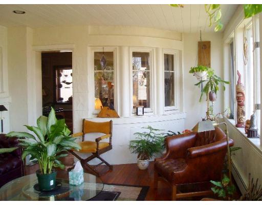 11 Clinton Road Brookline, MA 02445 - Photo 5 of 7 a living room with furniture and a potted plant