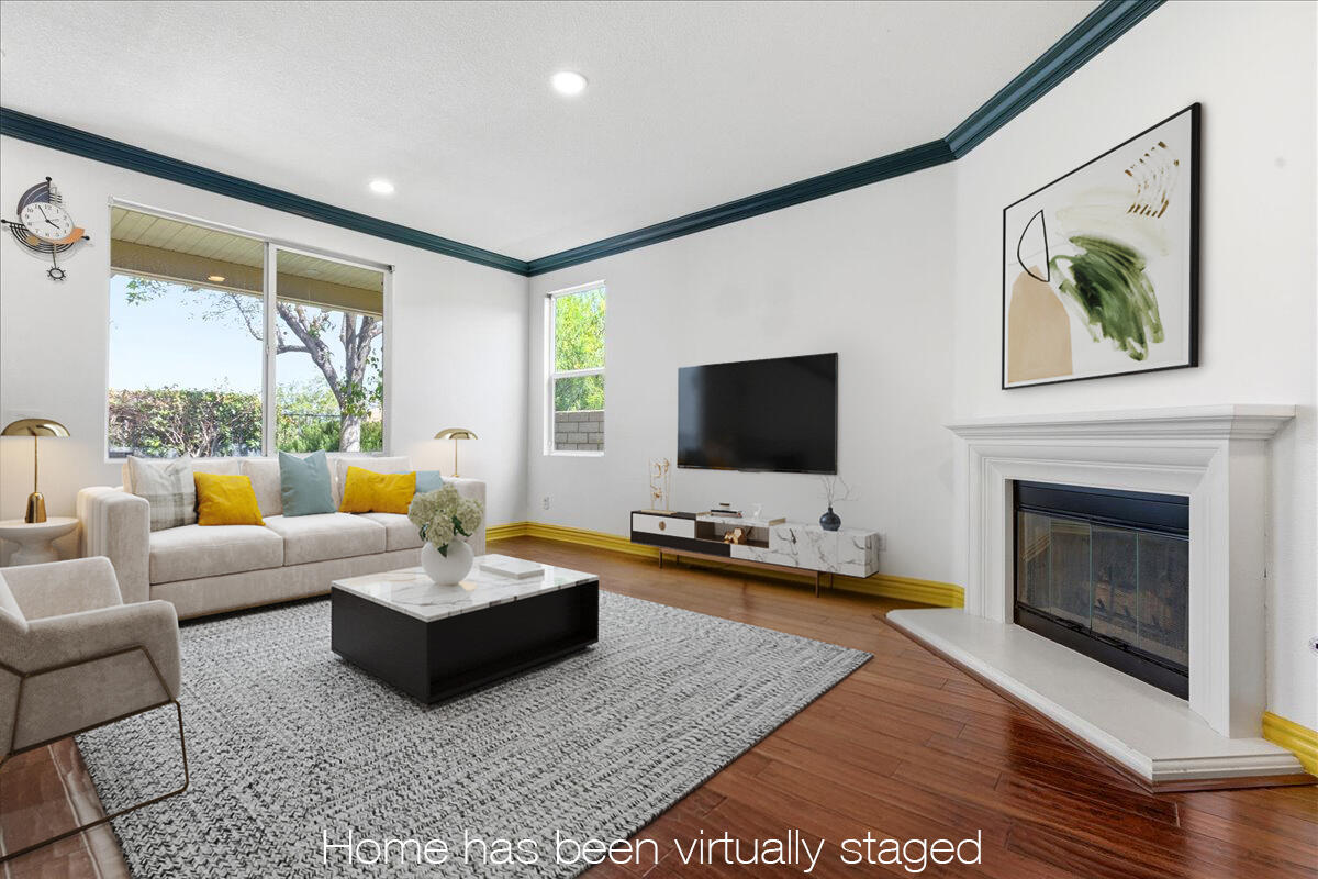 23732 Bella Vista Road Corona, CA 92883 - Photo 15 of 49 a living room with furniture and a flat screen tv