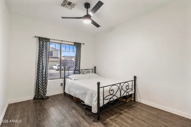 a kitchen with stainless steel appliances granite countertop a stove refrigerator and a sink