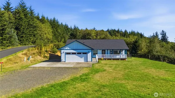 a house view with a garden space
