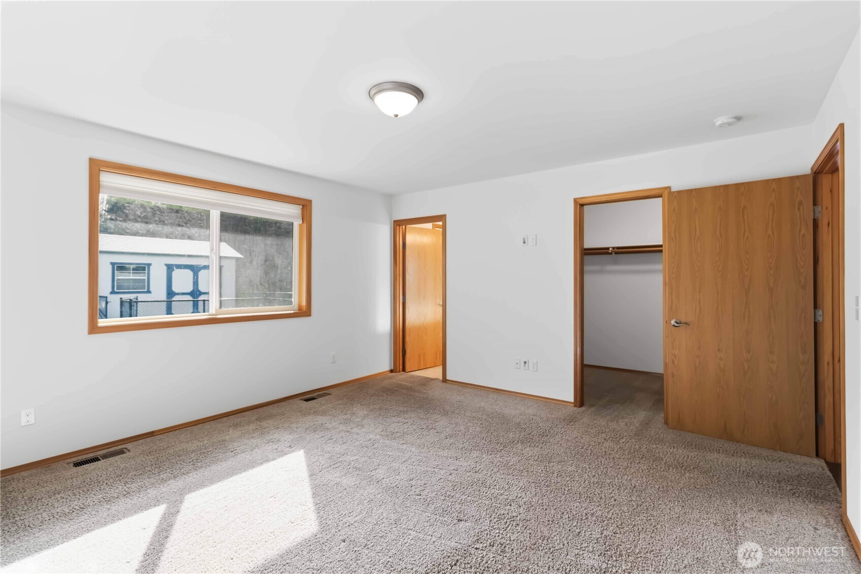 58 Alger Creek Heights Road Cathlamet, WA 98612 - Photo 24 of 40 a view of an empty room with a window