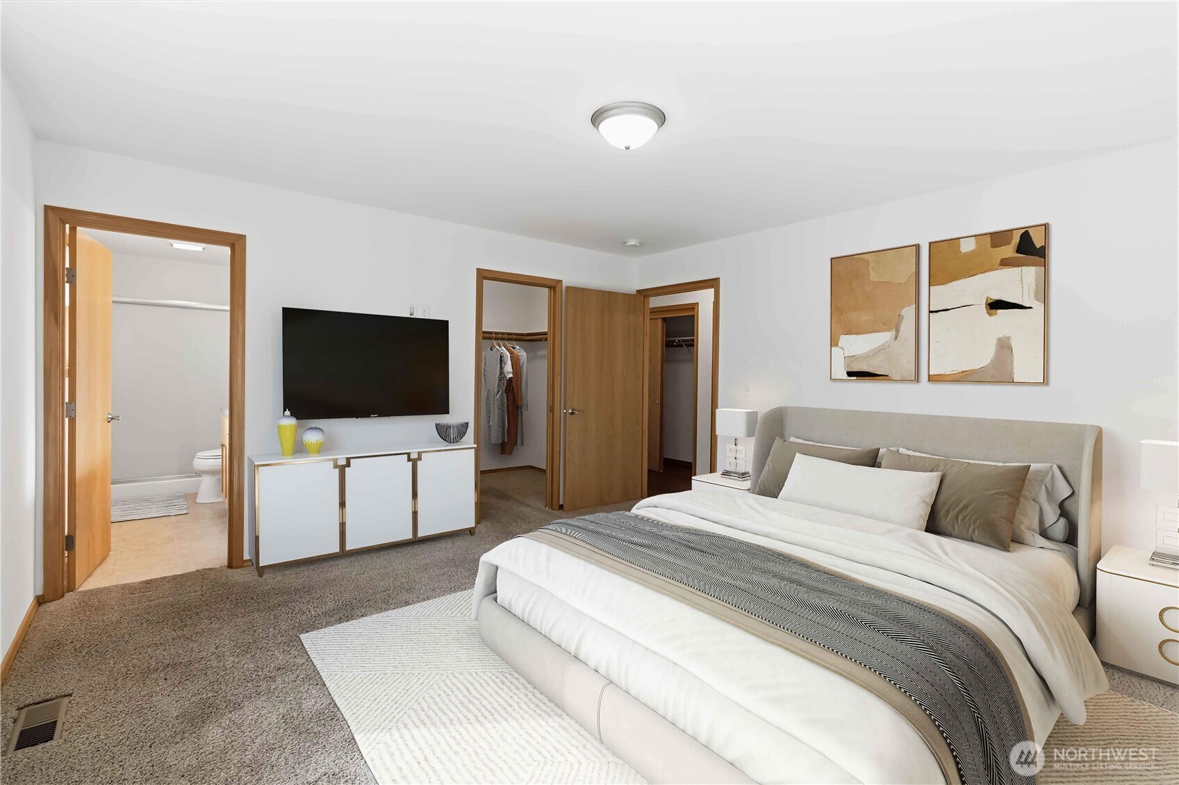 58 Alger Creek Heights Road Cathlamet, WA 98612 - Photo 25 of 40 a bedroom with a flat screen tv and a bed