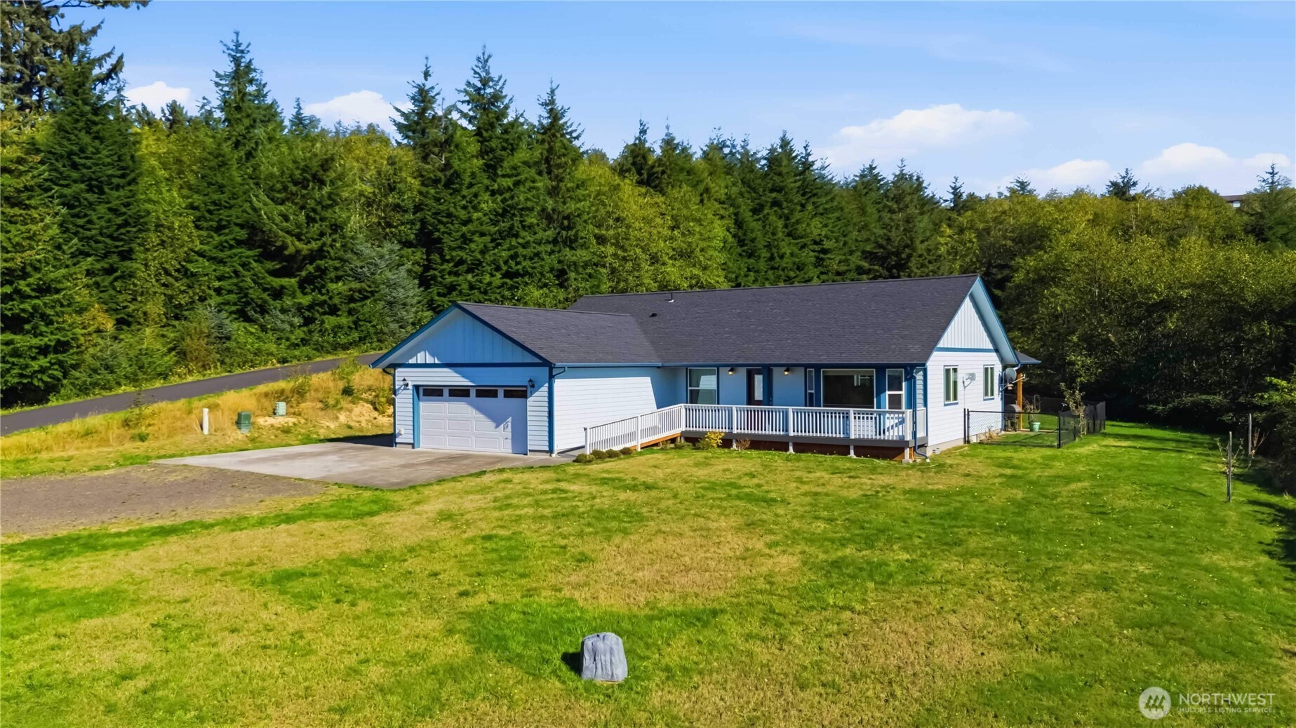58 Alger Creek Heights Road Cathlamet, WA 98612 - Photo 3 of 40 a house view with a garden space