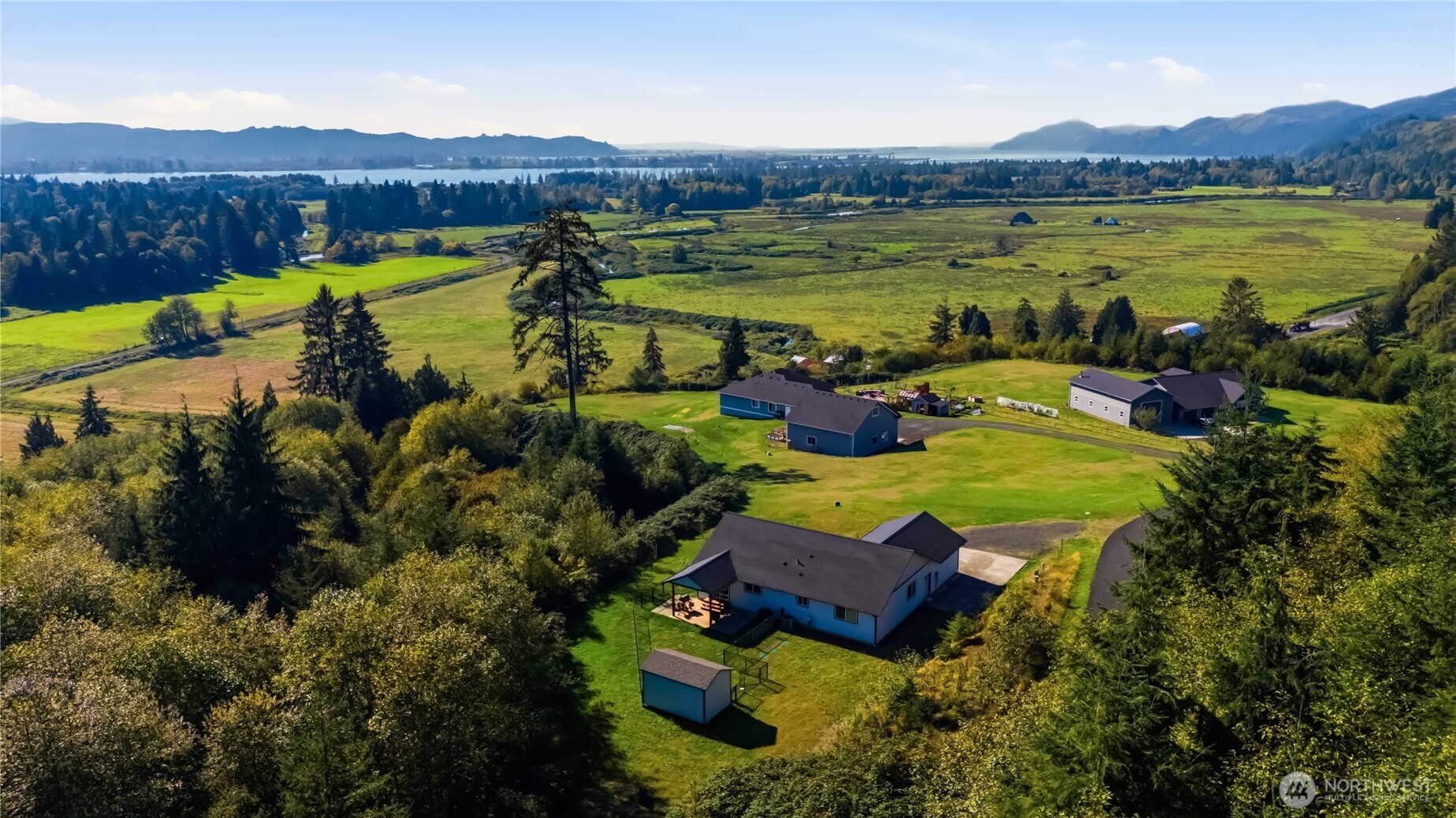 58 Alger Creek Heights Road Cathlamet, WA 98612 - Photo 36 of 40 a view of a lake with houses