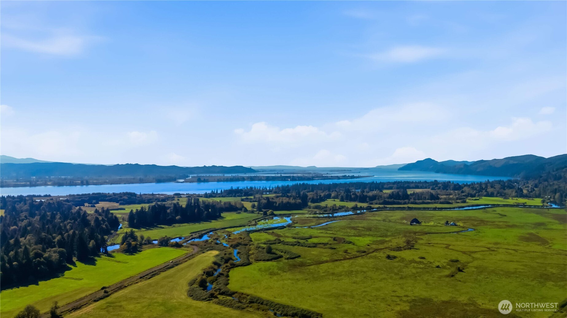 58 Alger Creek Heights Road Cathlamet, WA 98612 - Photo 6 of 40 an aerial view of residential houses with outdoor space and trees