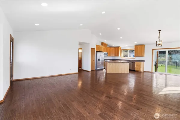 a view of kitchen with wooden floor