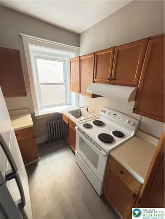 an empty room with a empty space and window