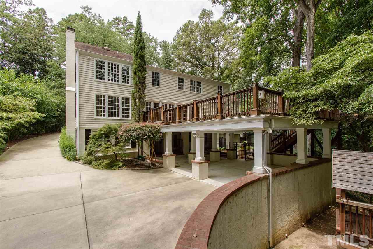 2726 Cambridge Road Raleigh, NC 27608 - Photo 4 of 25 a view of a building with a patio