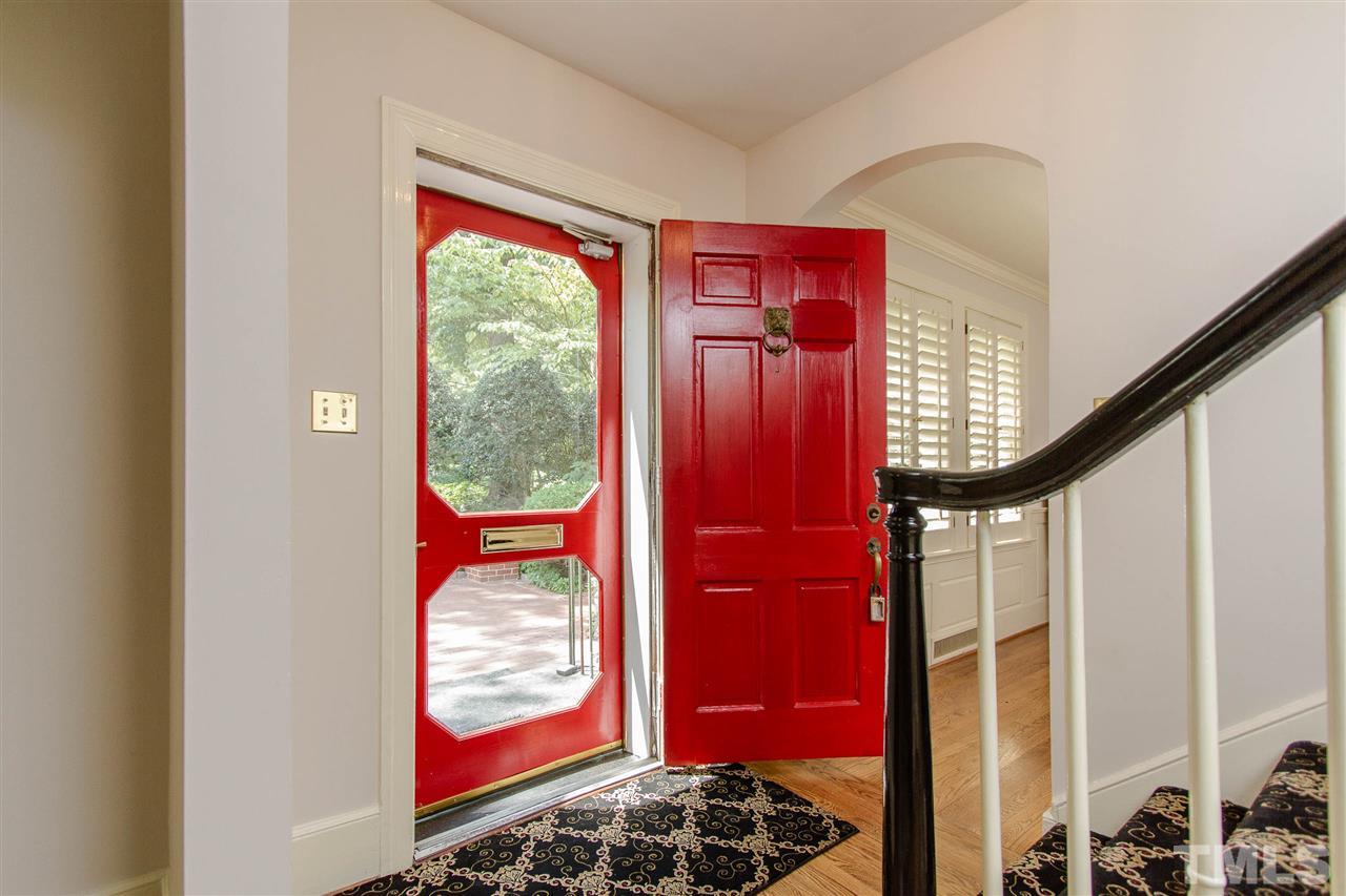 2726 Cambridge Road Raleigh, NC 27608 - Photo 5 of 25 a view of hallway with furniture and a window