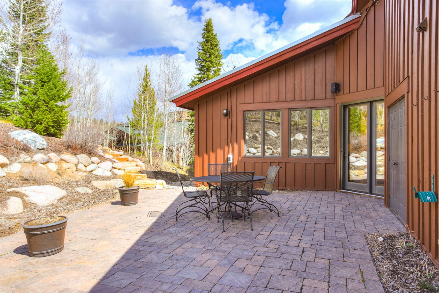 727 Willowbrook Road Silverthorne, CO 80498 - Photo 38 of 47 Large patio off family room accessed from inside or around the east side of the exterior