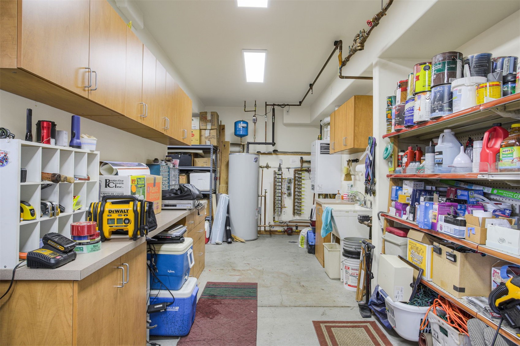 727 Willowbrook Road Silverthorne, CO 80498 - Photo 10 of 47 Storage mech room, water heater, work benches, wash sink