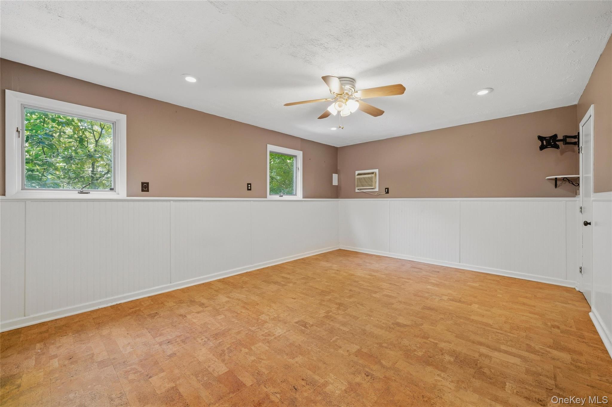 44 Sayer Road Blooming Grove, NY 10914 - Photo 23 of 39 an empty room with a window and a ceiling fan