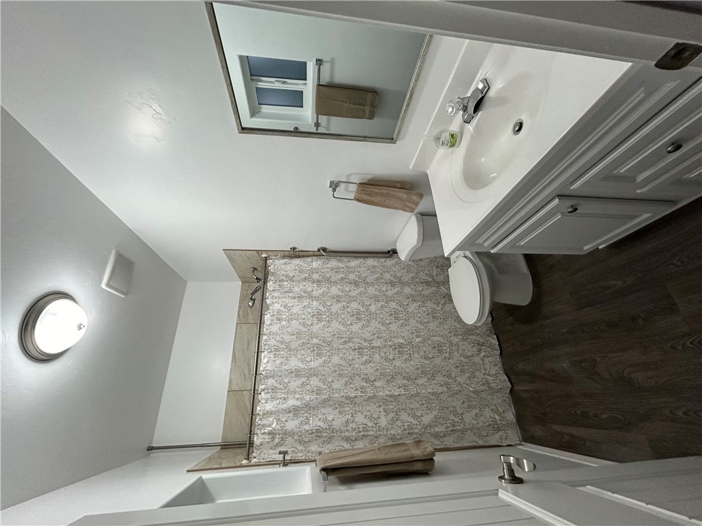 2191 Seneca Street Kingman, AZ 86401 - Photo 20 of 26 a bathroom with a sink toilet and shower