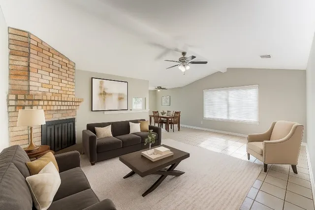 a living room with furniture and a window
