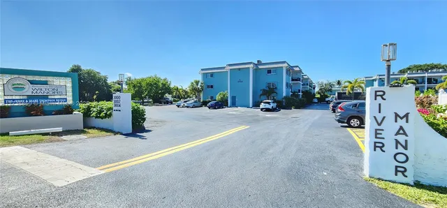 a view of a street with cars