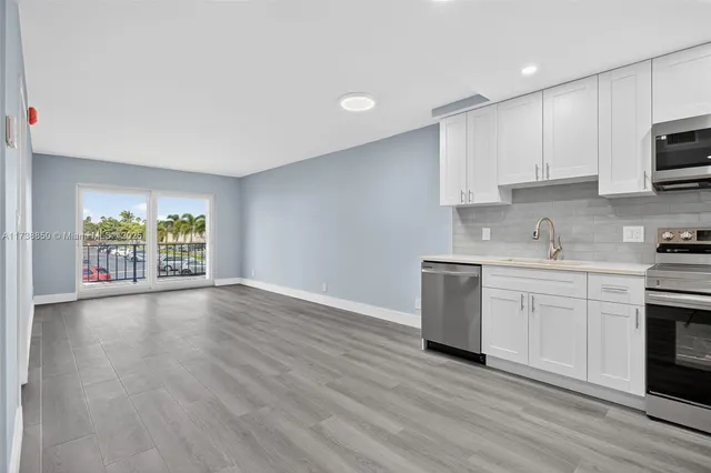 a view of wooden floor in a bathroom