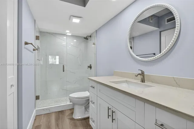 a view of a living room and balcony