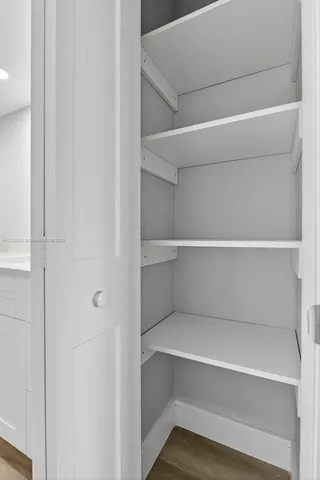 a lobby with furniture and lots of table