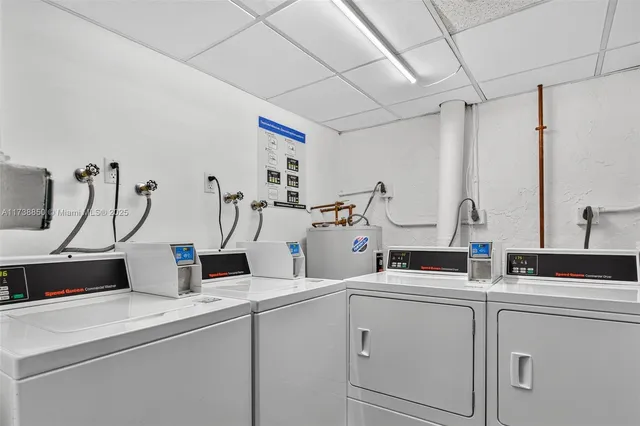 a view of a lake with houses in the back