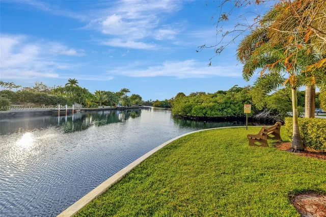 a front view of a building with parking space