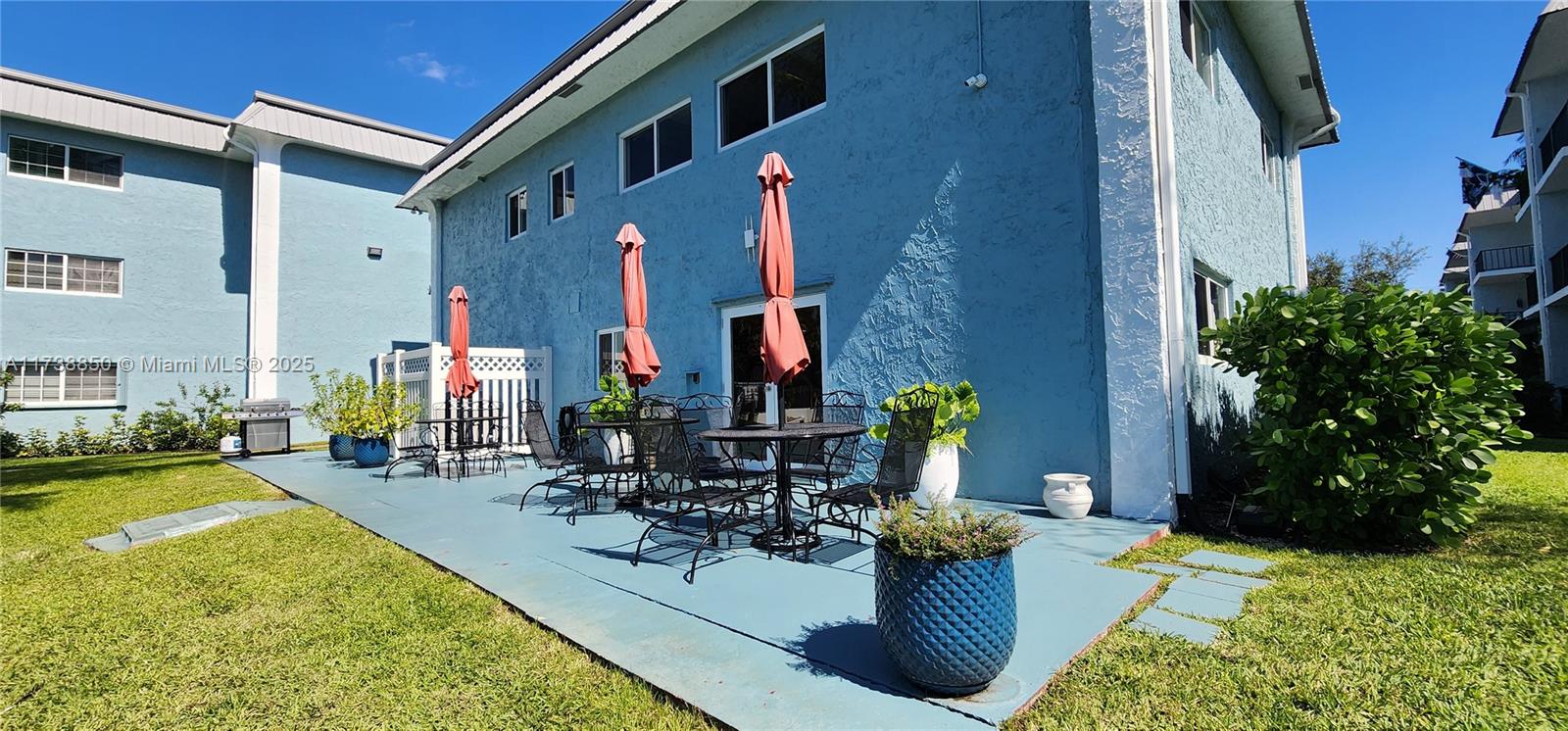 3004 Northeast 5th Terrace, Unit 214C Wilton Manors, FL 33334 - Photo 70 of 99 a view of swimming pool with outdoor seating