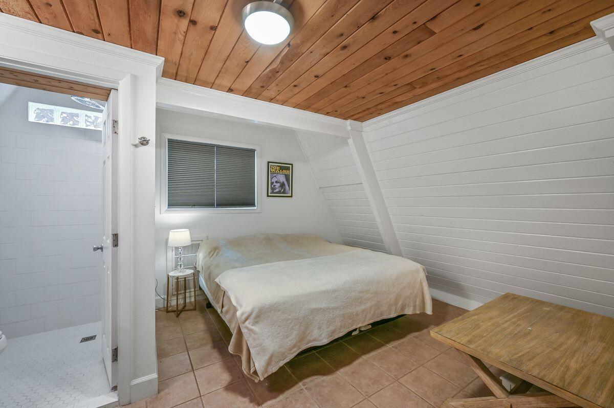 70 Dogwood Street Santa Rosa Beach, FL 32459 - Photo 9 of 15 a bedroom with a bed and window