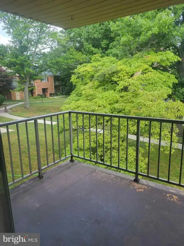a view of a street from a balcony