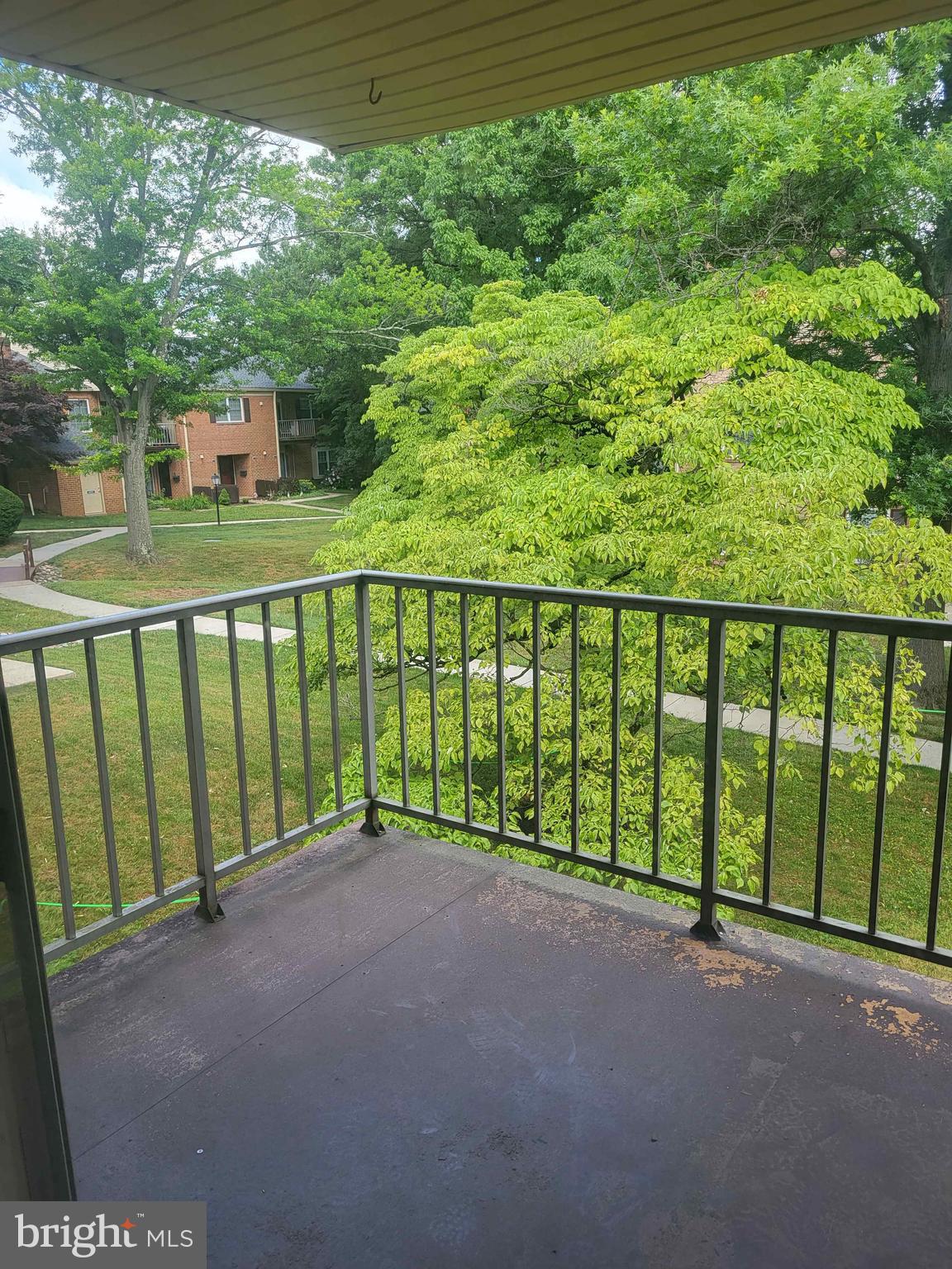 339 Old Forge Crossing, Unit 339 Devon, PA 19333 - Photo 3 of 6 a view of a street from a balcony