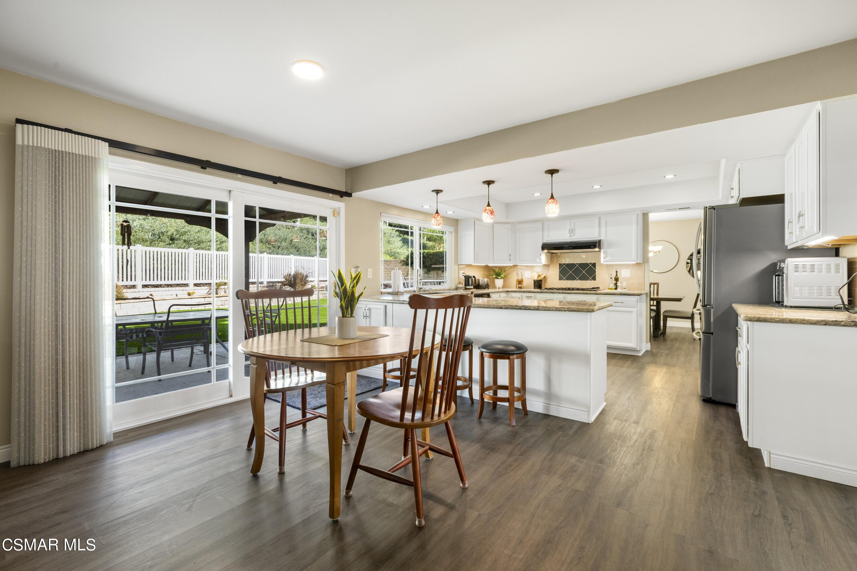 2992 Chippewa Avenue Simi Valley, CA 93063 - Photo 16 of 35 a dining room with furniture and wooden floor