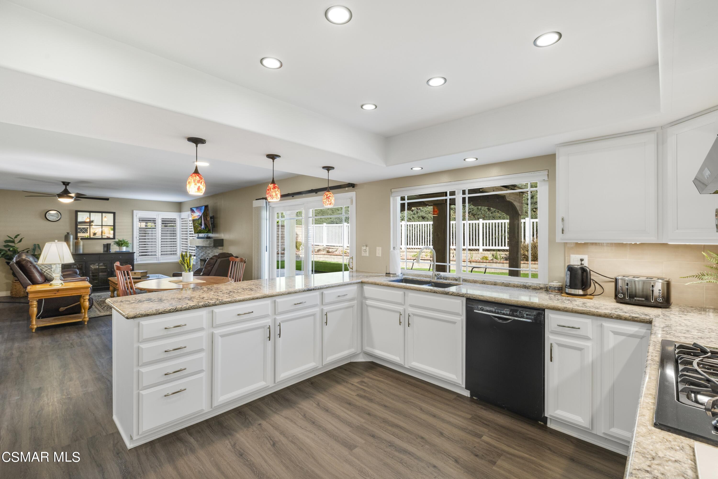 2992 Chippewa Avenue Simi Valley, CA 93063 - Photo 17 of 35 a kitchen with sink stove and cabinets