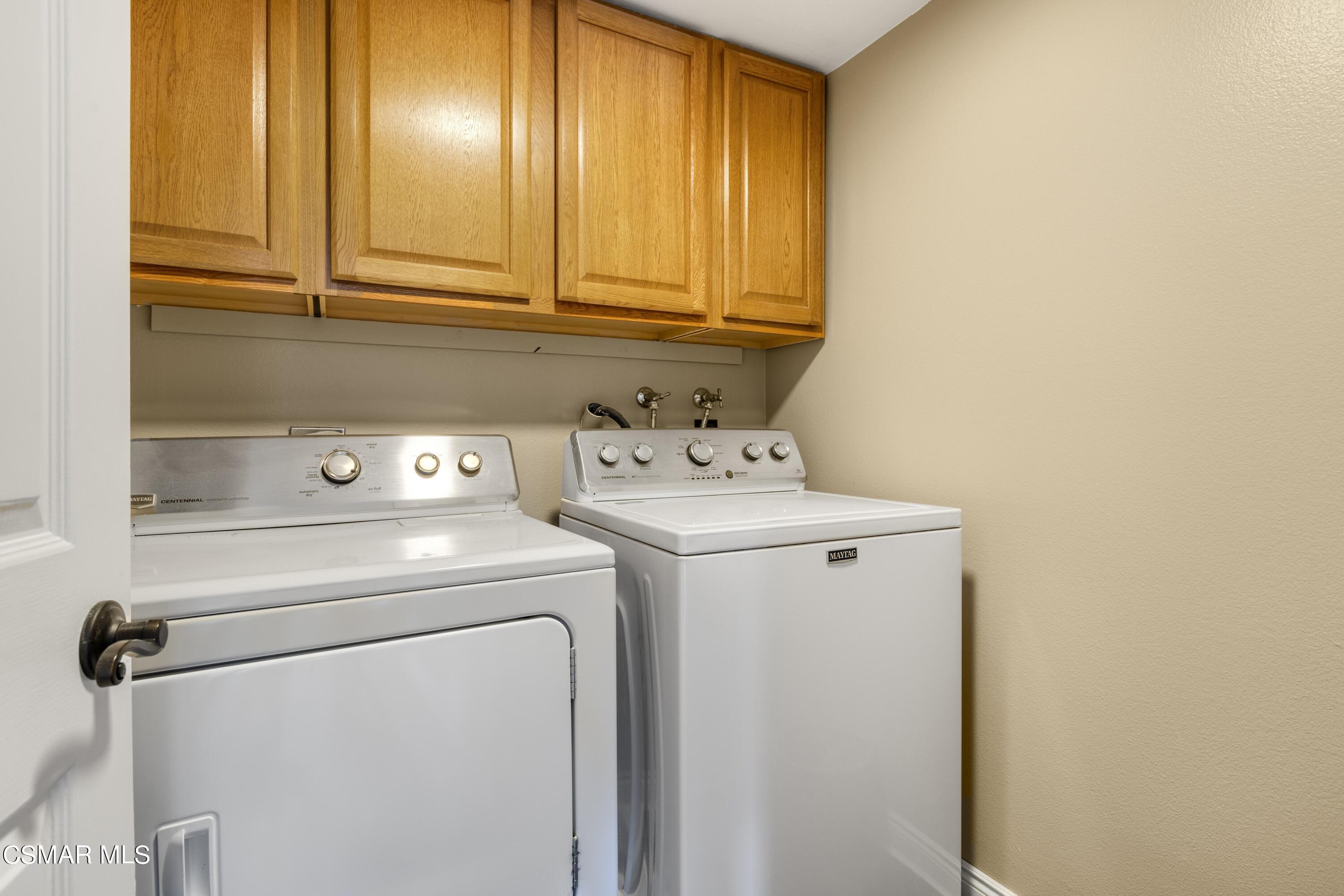 2992 Chippewa Avenue Simi Valley, CA 93063 - Photo 22 of 35 a utility room with dryer and washer