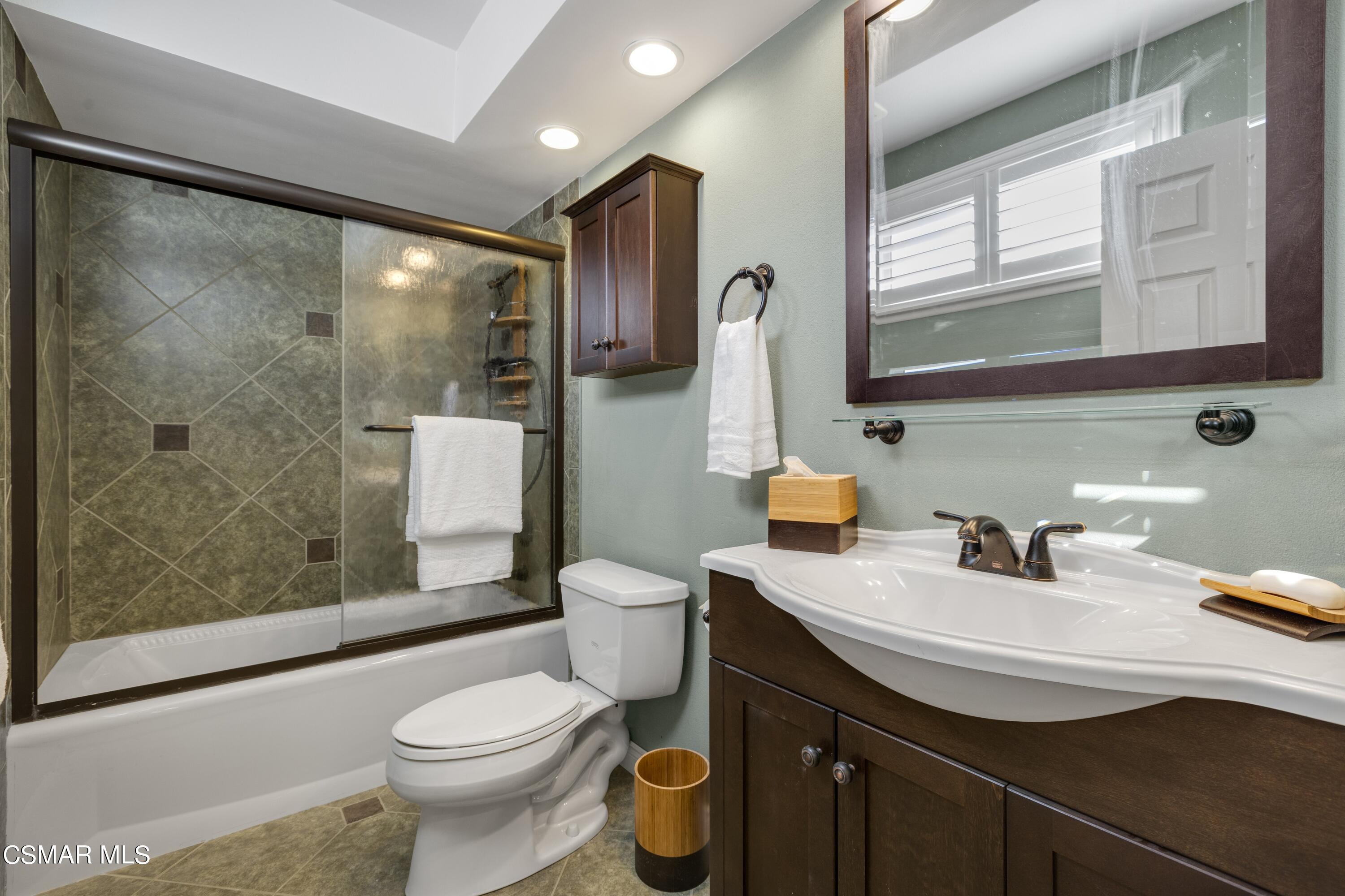 2992 Chippewa Avenue Simi Valley, CA 93063 - Photo 28 of 35 a bathroom with a sink toilet and shower