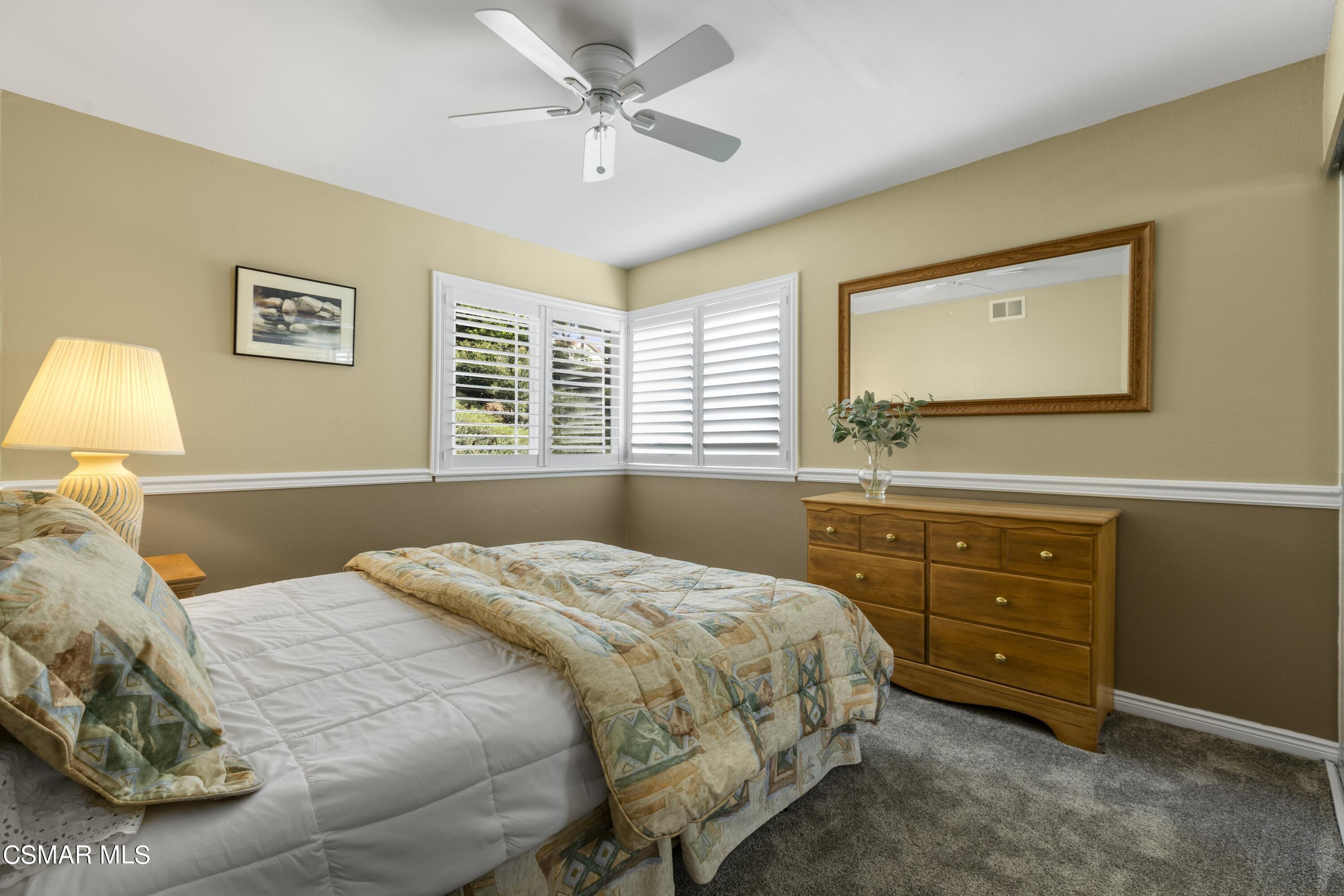 2992 Chippewa Avenue Simi Valley, CA 93063 - Photo 30 of 35 a bedroom with a bed and a window