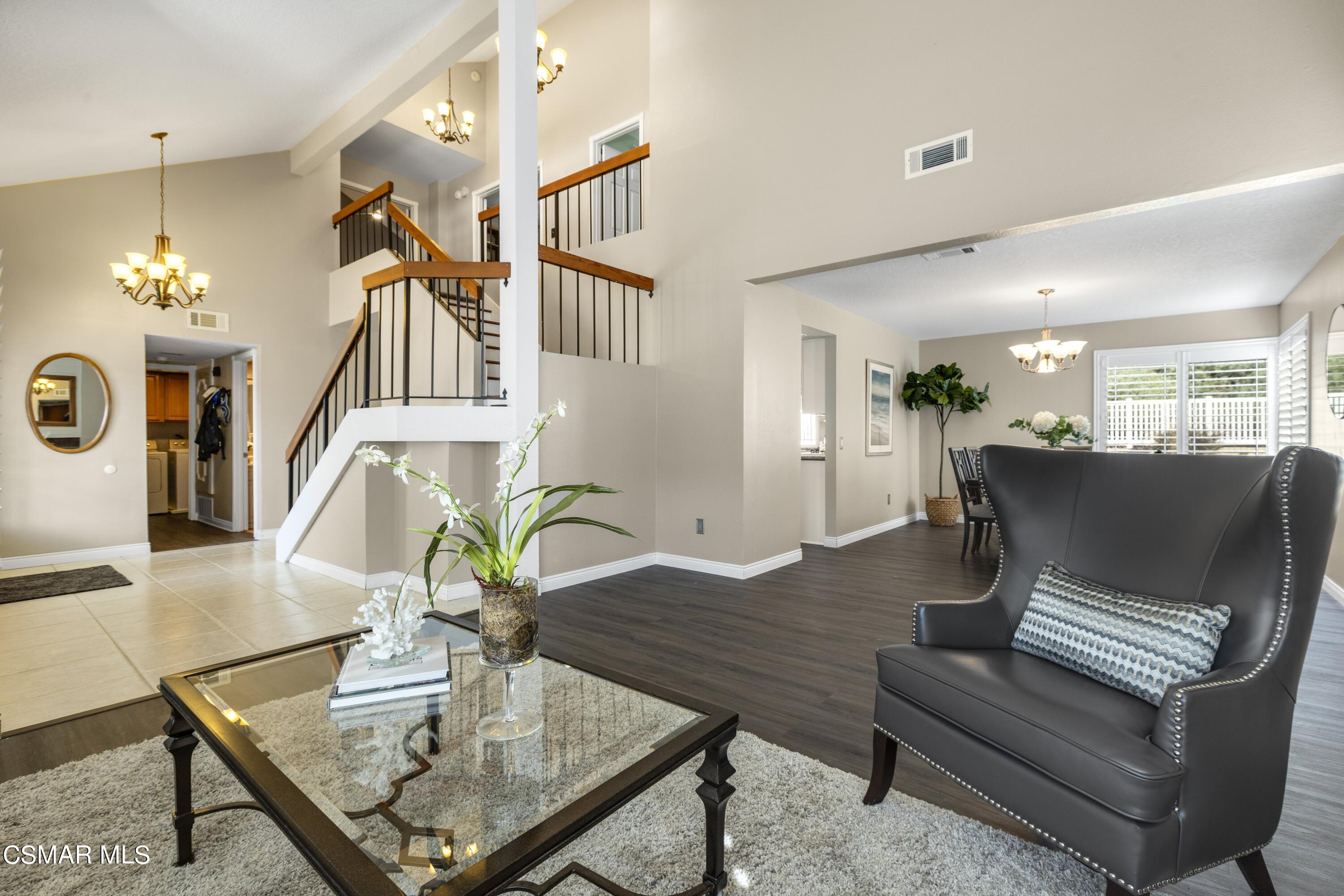 2992 Chippewa Avenue Simi Valley, CA 93063 - Photo 8 of 35 a living room with furniture and a chandelier