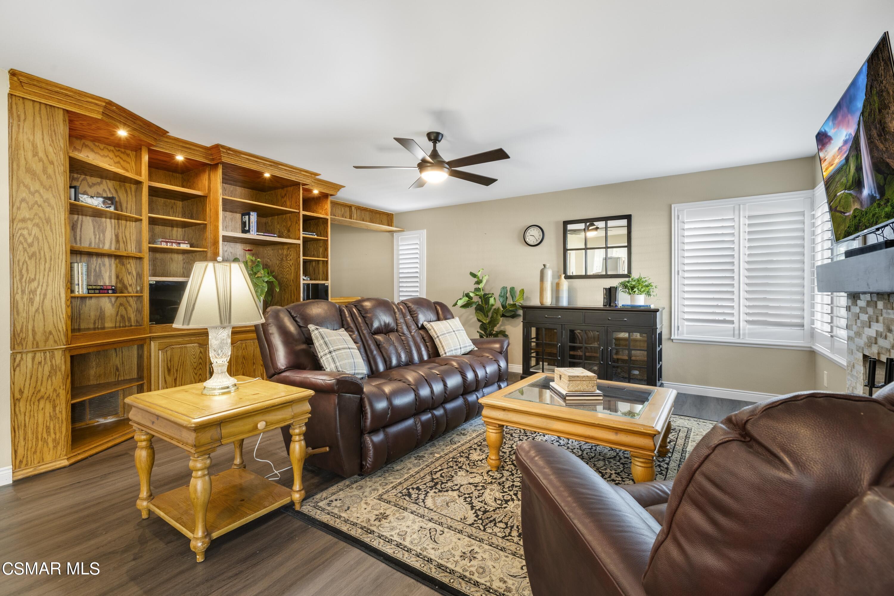 2992 Chippewa Avenue Simi Valley, CA 93063 - Photo 10 of 35 a living room with furniture a rug and a window