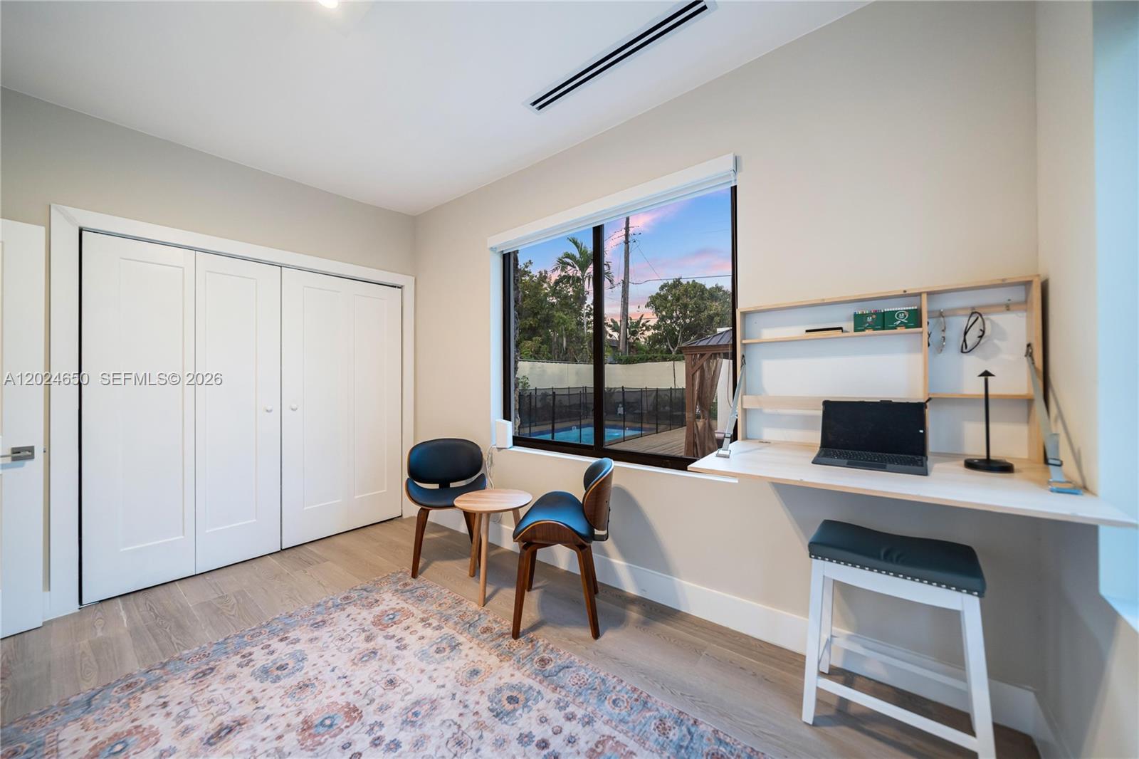 1663 Southwest 13th Street Miami, FL 33145 - Photo 45 of 112 a living room with furniture a window and a fireplace