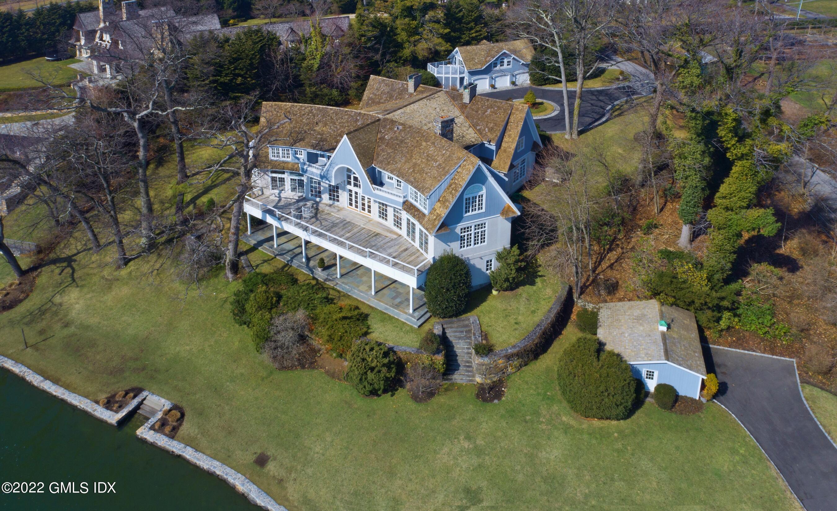 117 Meadow Road Riverside, CT 06878 - Photo 3 of 48 an aerial view of residential house with outdoor space and swimming pool