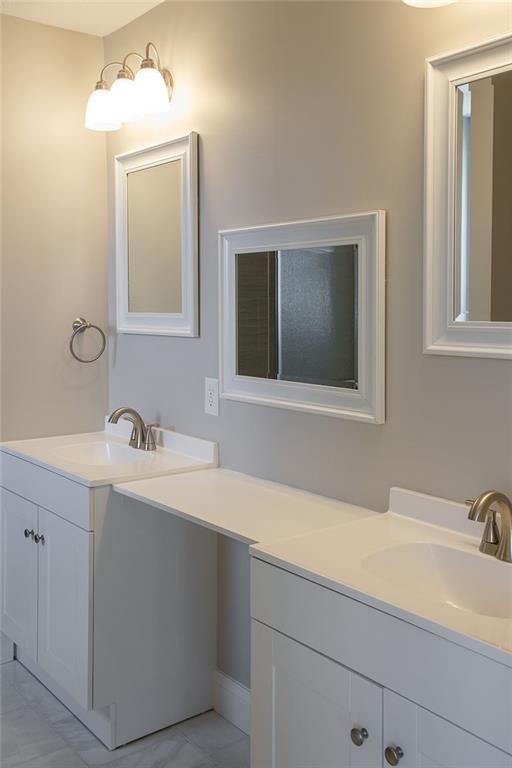 1070 Chapel Road Monaca, PA 15061 - Photo 11 of 24 a bathroom with a sink and a mirror