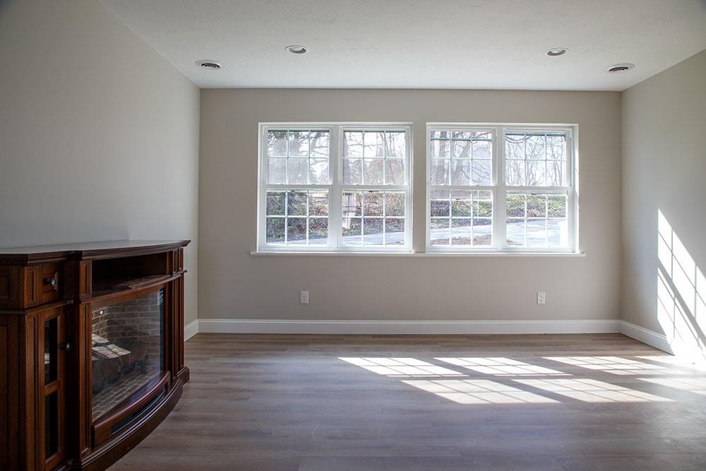 1070 Chapel Road Monaca, PA 15061 - Photo 17 of 24 a view of an empty room with wooden floor and a window
